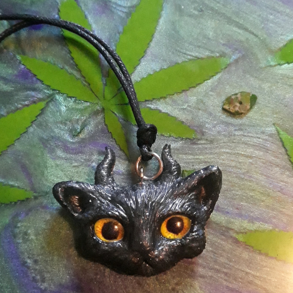 Yellow eyes the Dragon Kitty pendant